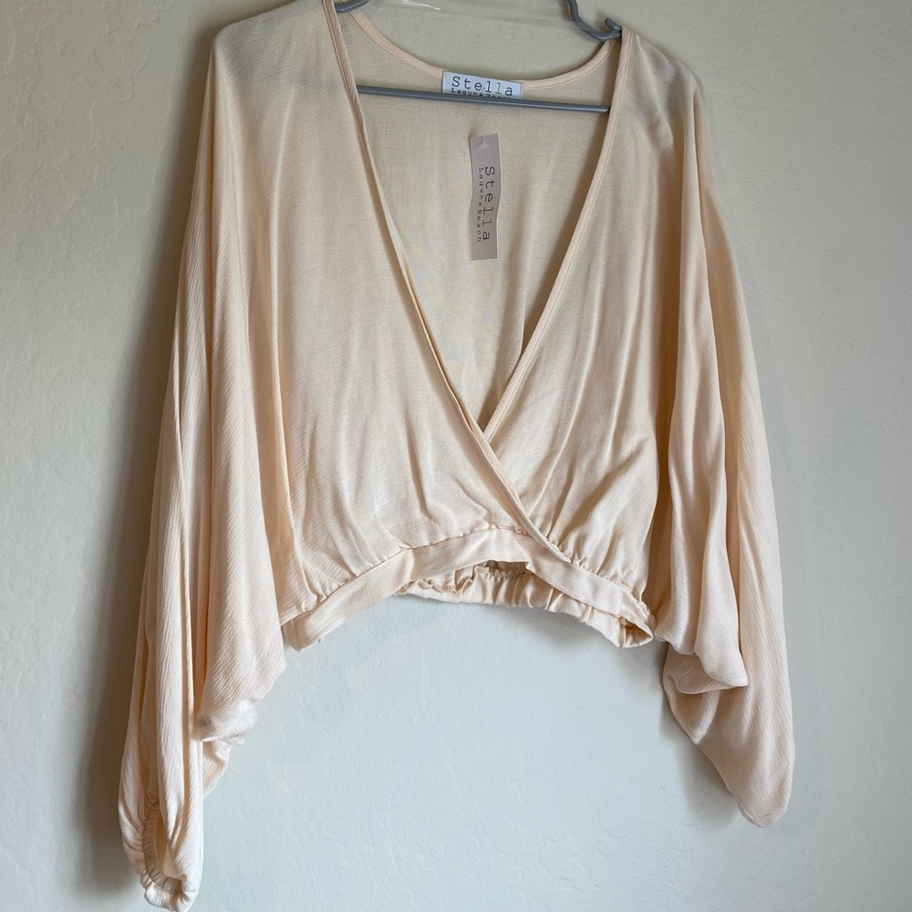 Boutique cream flowy blouse